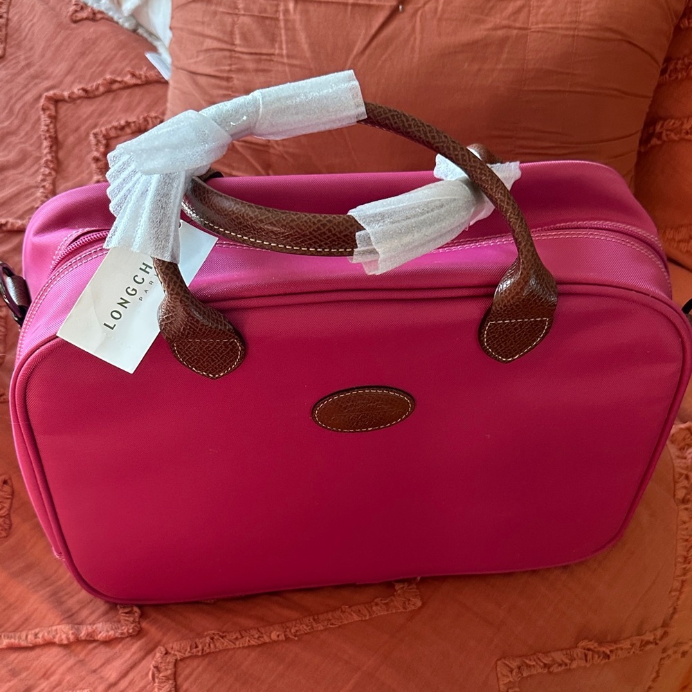 Longchamp Fuchsia Travel Bag with Brown Accents